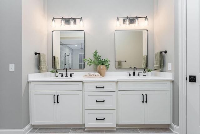 bathroom featuring vanity and a shower