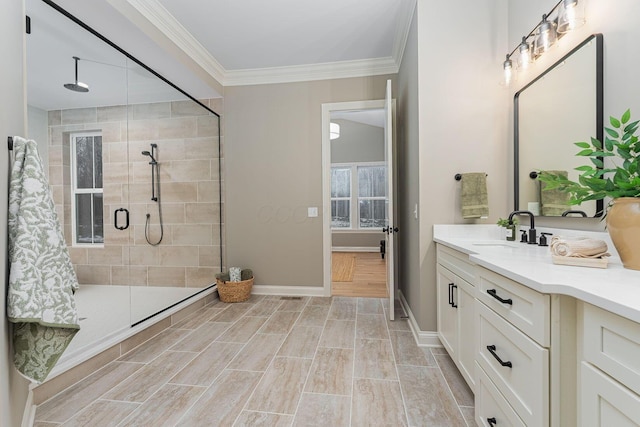 bathroom with vanity, an enclosed shower, crown molding, and hardwood / wood-style floors