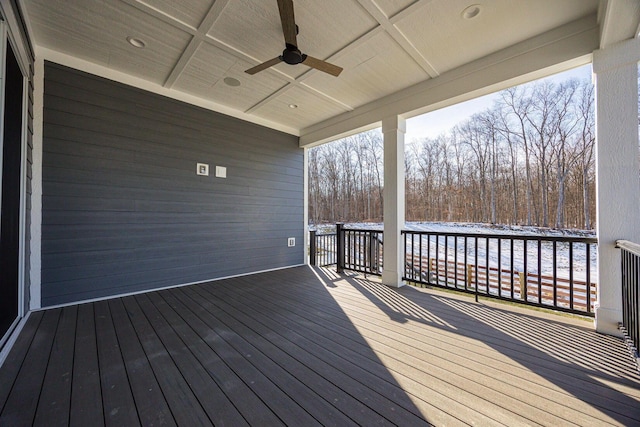 wooden terrace featuring ceiling fan