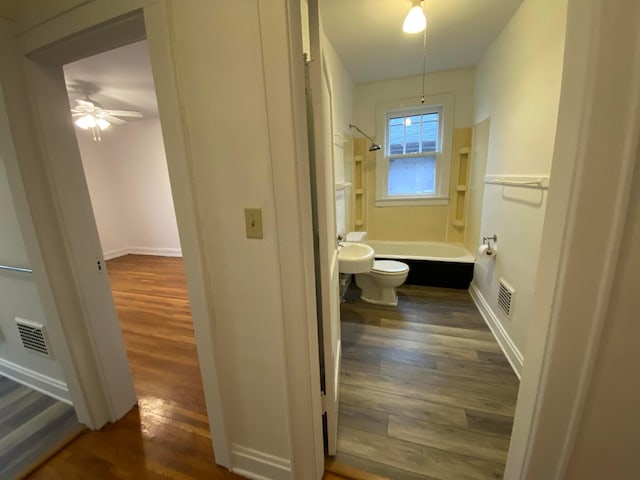 hallway with dark wood-type flooring