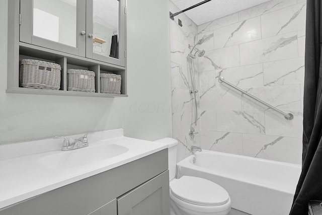 full bathroom featuring vanity, toilet, shower / tub combo, and a textured ceiling