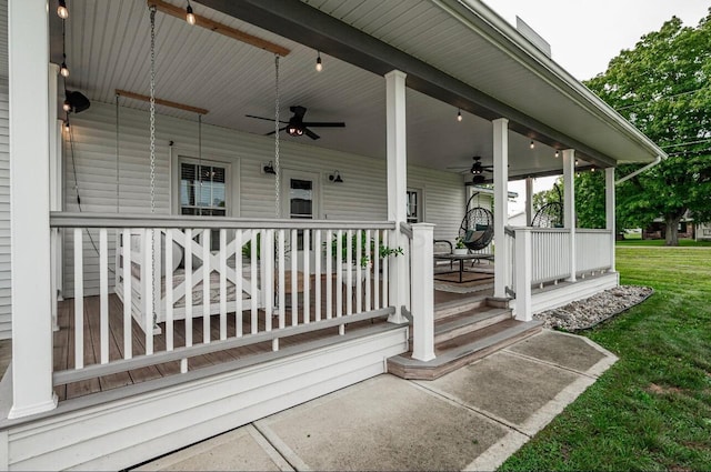 view of patio featuring ceiling fan and a porch