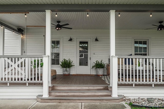 doorway to property with ceiling fan and covered porch