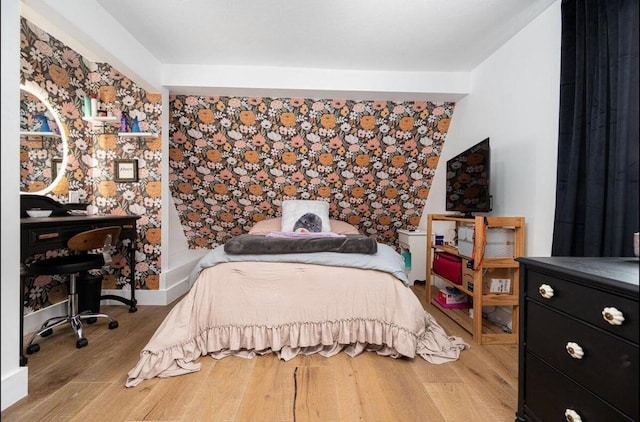 bedroom featuring light hardwood / wood-style floors