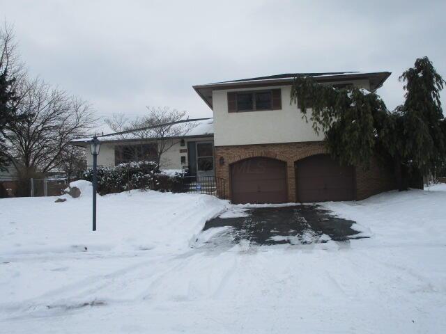 split level home with a garage