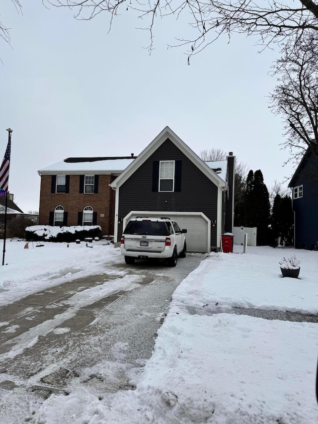 view of front of home with a garage