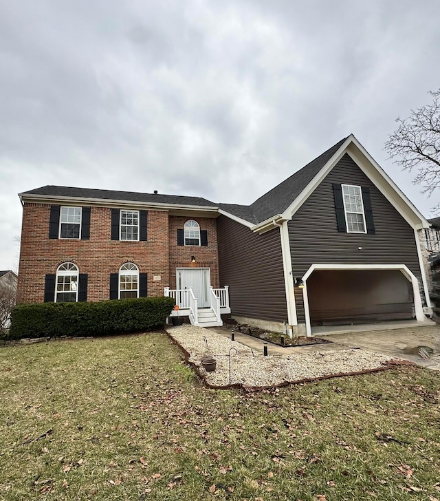 view of front of house with a garage and a front yard