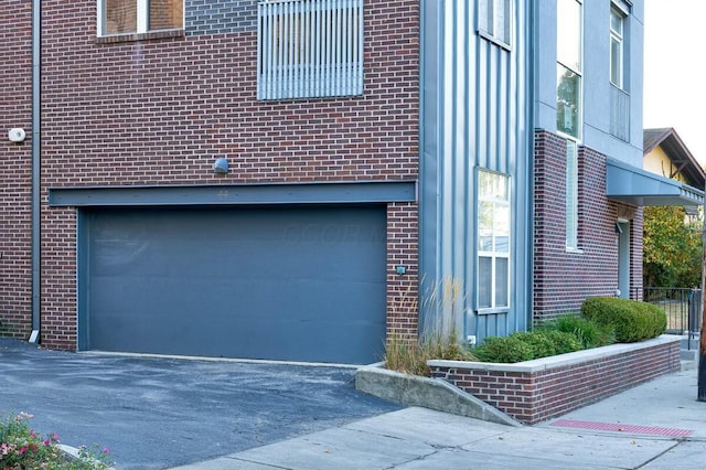 view of home's exterior with a garage