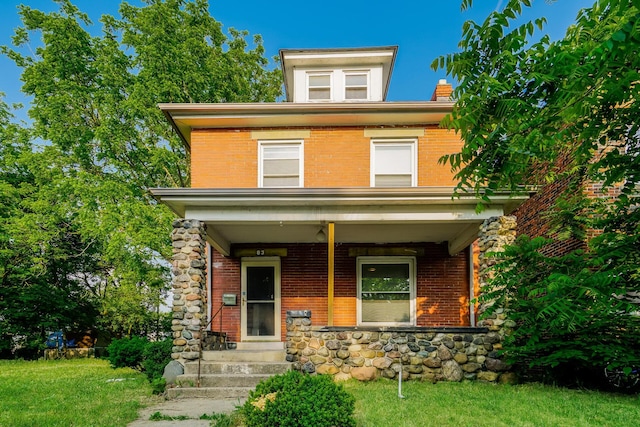 view of front of house with a front yard