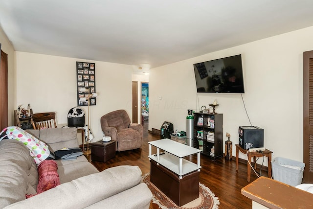 living room featuring dark hardwood / wood-style flooring