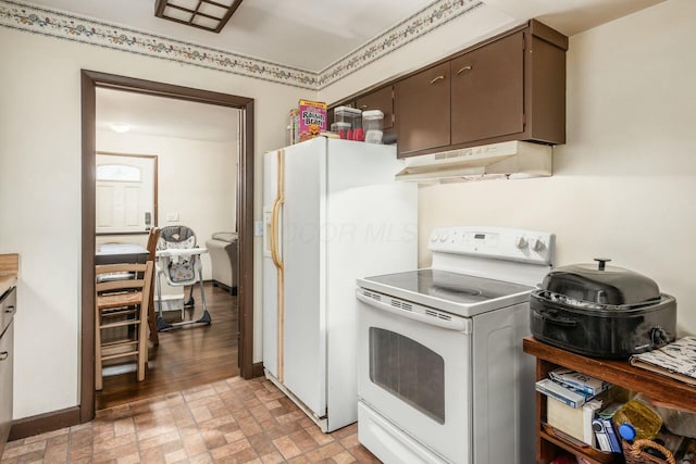 kitchen with white appliances and dark brown cabinets