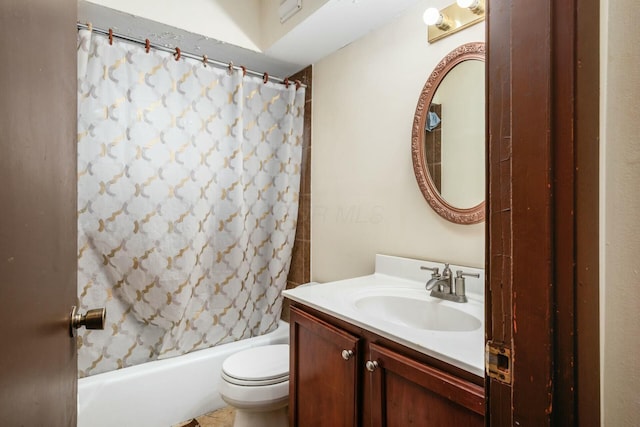 full bathroom with shower / tub combo, vanity, and toilet