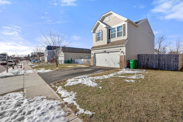 view of property exterior with a garage