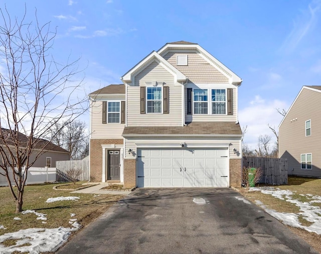 front of property with a garage