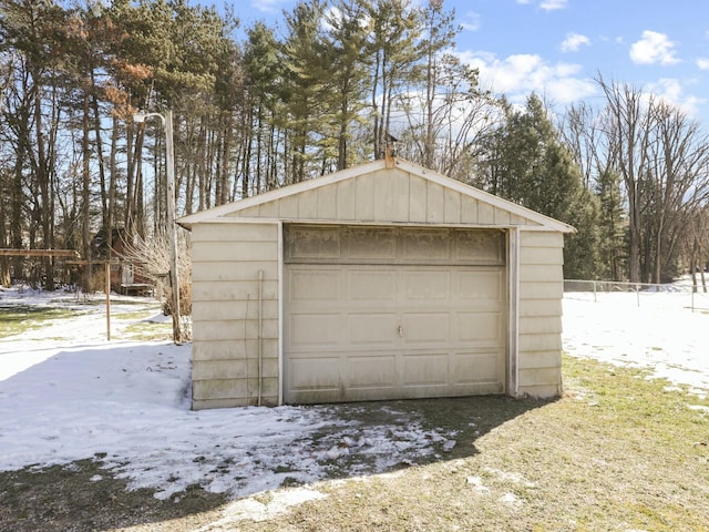 view of snow covered garage