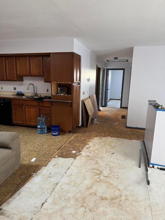 kitchen featuring dishwasher and sink