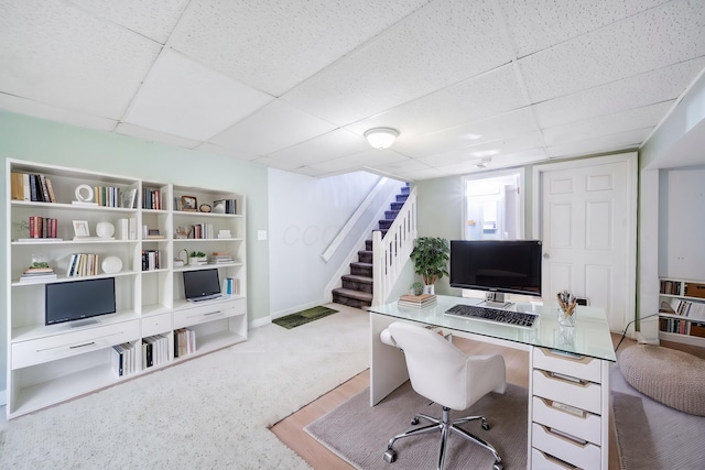 office with a paneled ceiling