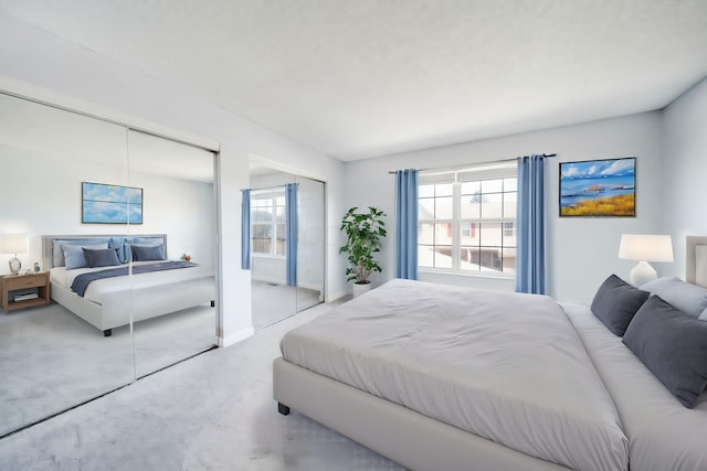 bedroom featuring two closets