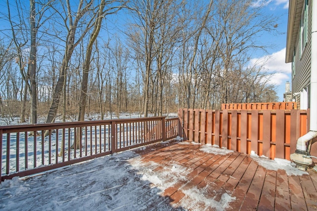 view of snow covered deck