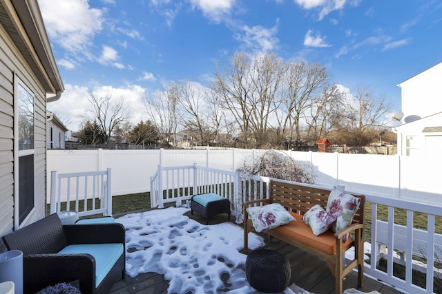 view of snow covered deck