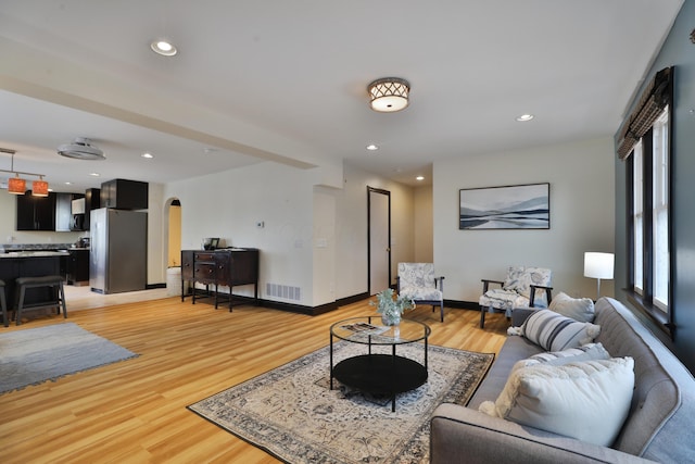 living room featuring light wood-type flooring