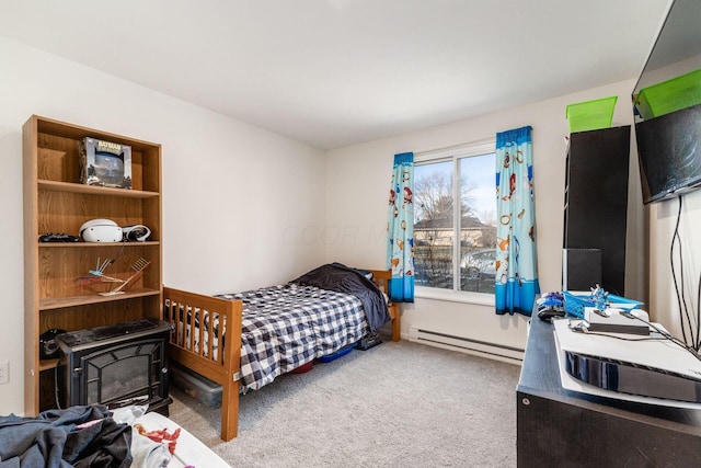 bedroom featuring carpet floors and a baseboard radiator