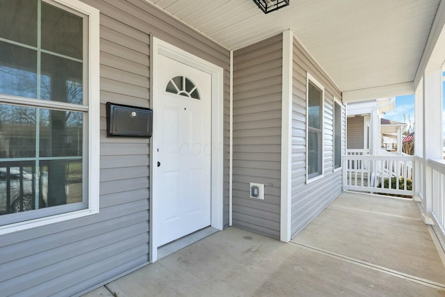 property entrance with a porch