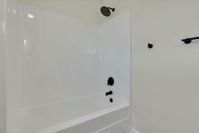 bathroom with shower / bathtub combination