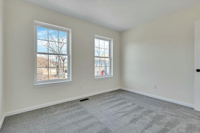 view of carpeted spare room