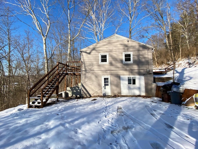 view of snow covered house