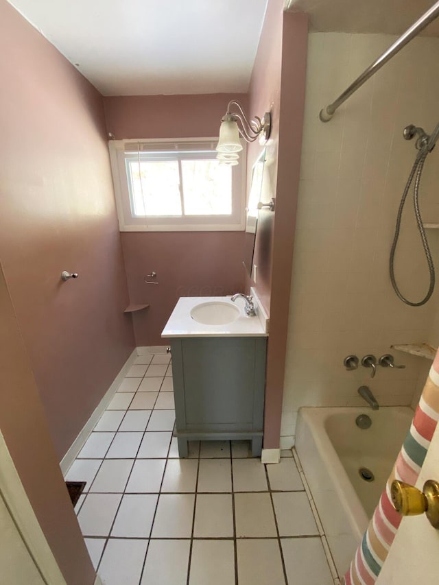 bathroom with tile patterned flooring, vanity, and shower / bath combo with shower curtain