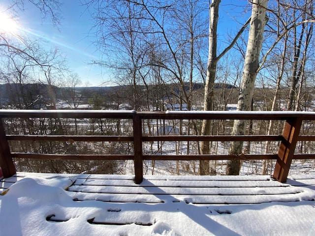 view of snow covered deck