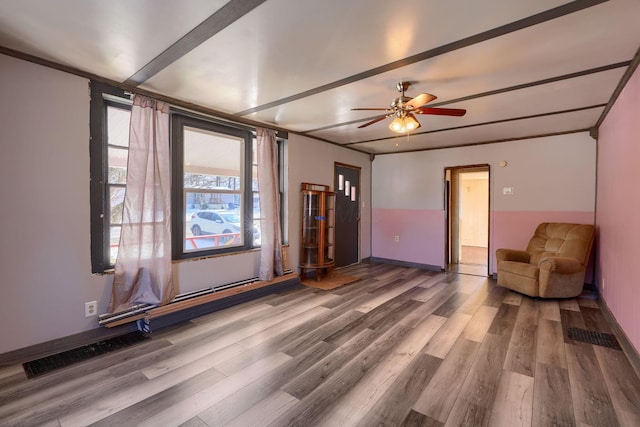 interior space with hardwood / wood-style flooring and ceiling fan