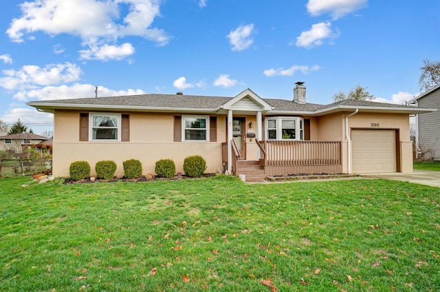 ranch-style house with a garage and a front lawn