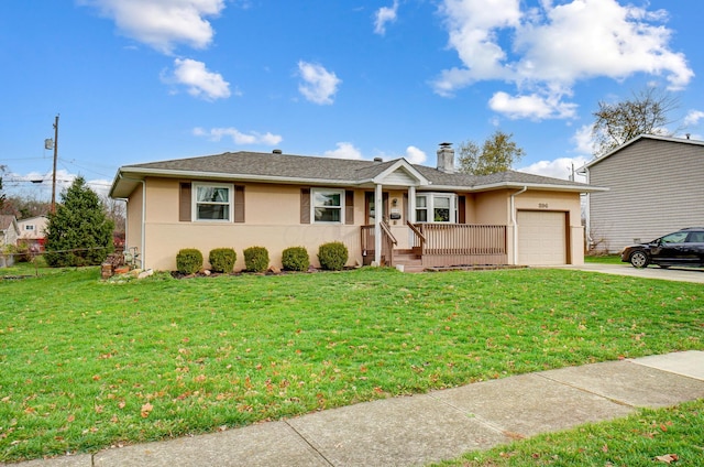 single story home featuring a garage and a front yard