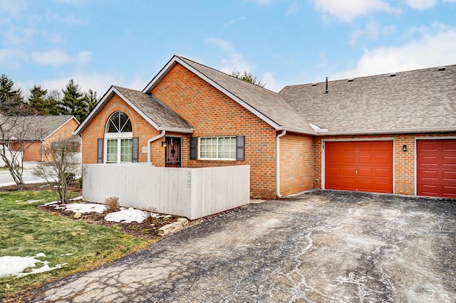 view of front of home with a garage