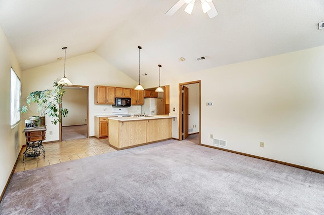 kitchen with ceiling fan, hanging light fixtures, high vaulted ceiling, white refrigerator with ice dispenser, and light colored carpet