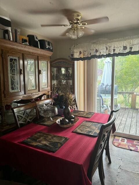 dining room featuring ceiling fan