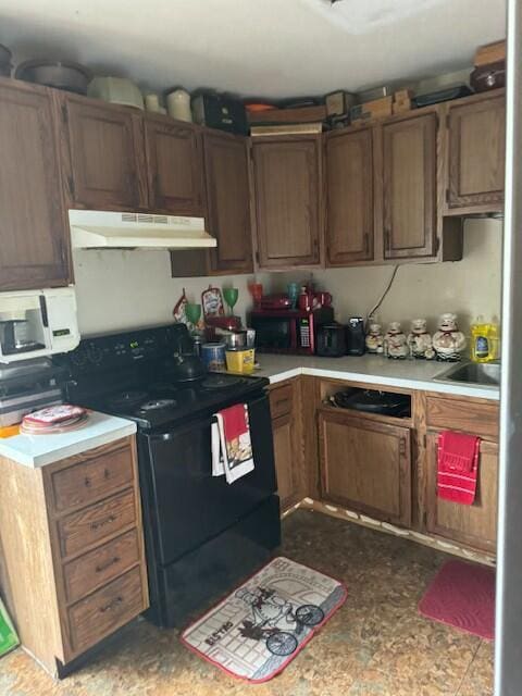 kitchen featuring black electric range oven