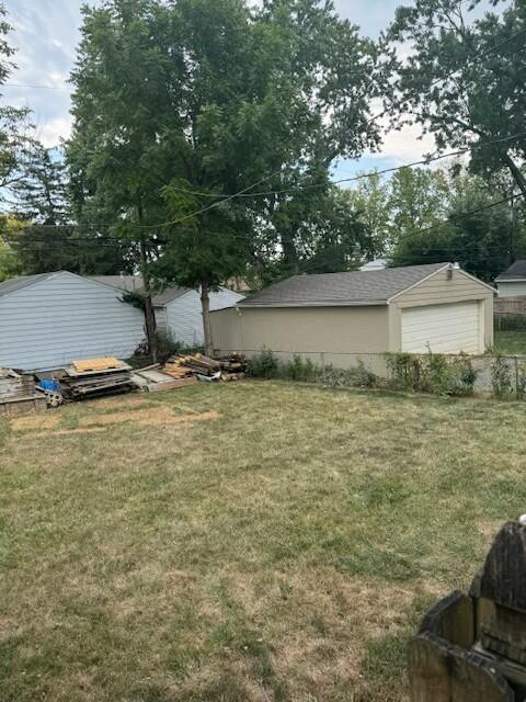 view of yard with a garage