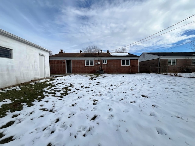 view of snow covered property