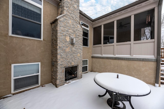 view of patio / terrace with an outdoor stone fireplace