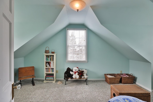 bonus room featuring lofted ceiling and carpet floors