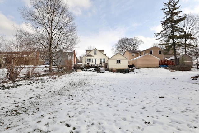 view of snow covered house