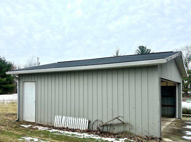 view of outdoor structure featuring a garage