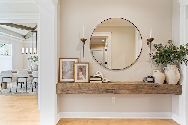 bathroom featuring hardwood / wood-style floors and beamed ceiling