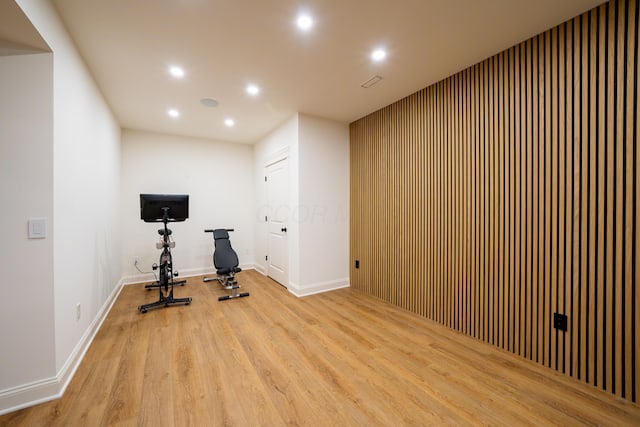 workout area with light wood-type flooring