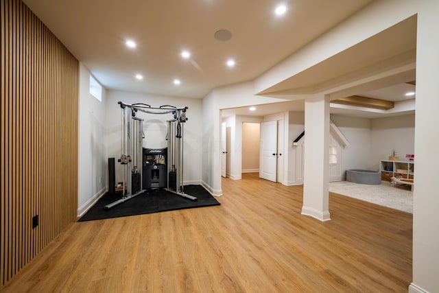 workout area featuring light wood-type flooring