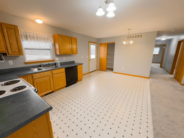 kitchen with pendant lighting, a wealth of natural light, dishwasher, sink, and a chandelier