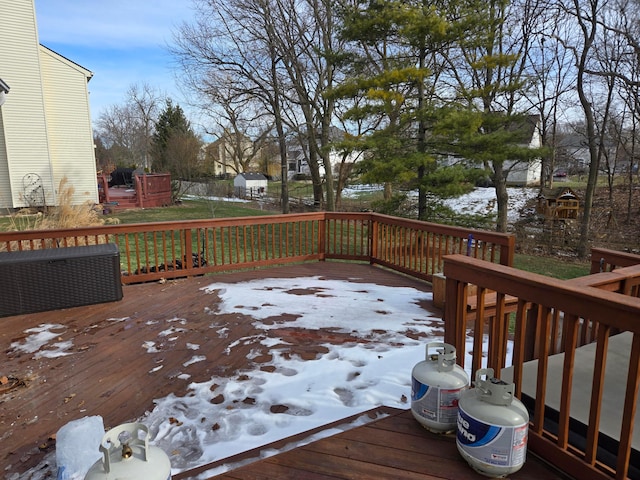 view of snow covered deck